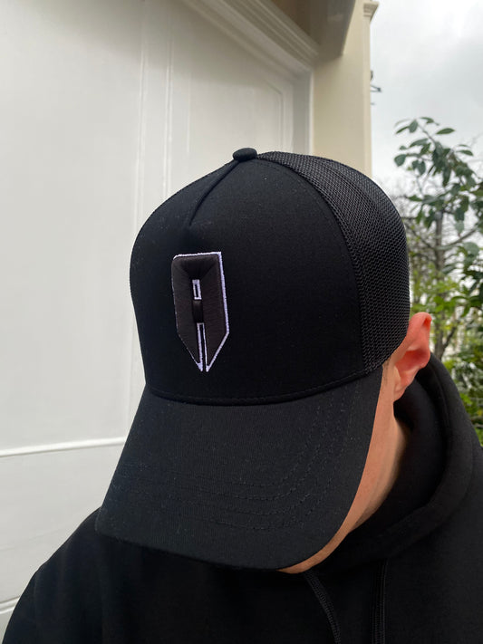 BLACK A LOGO TRUCKER CAP